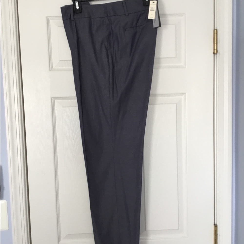 Grey/blue suit. New with tags still on.